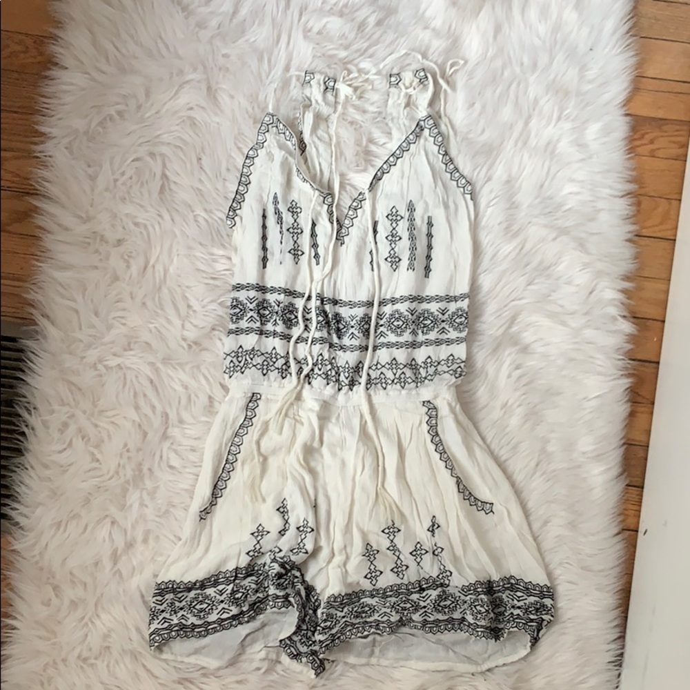 Brand new without tags Willow and Clay romper.